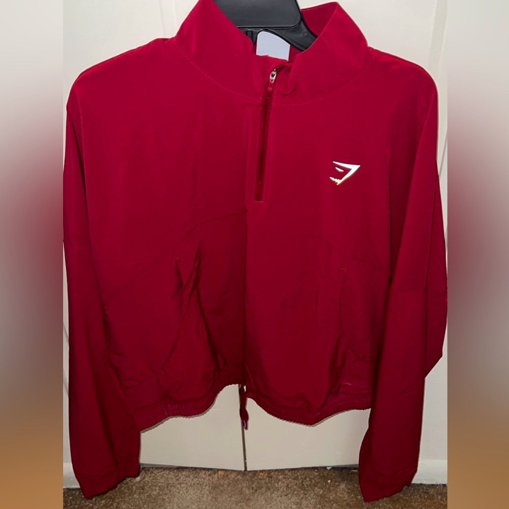 GYMSHARK red cropped rain jacket